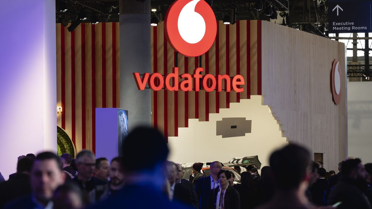vodafone logo pictured in mwc 2024 tradeshow floor