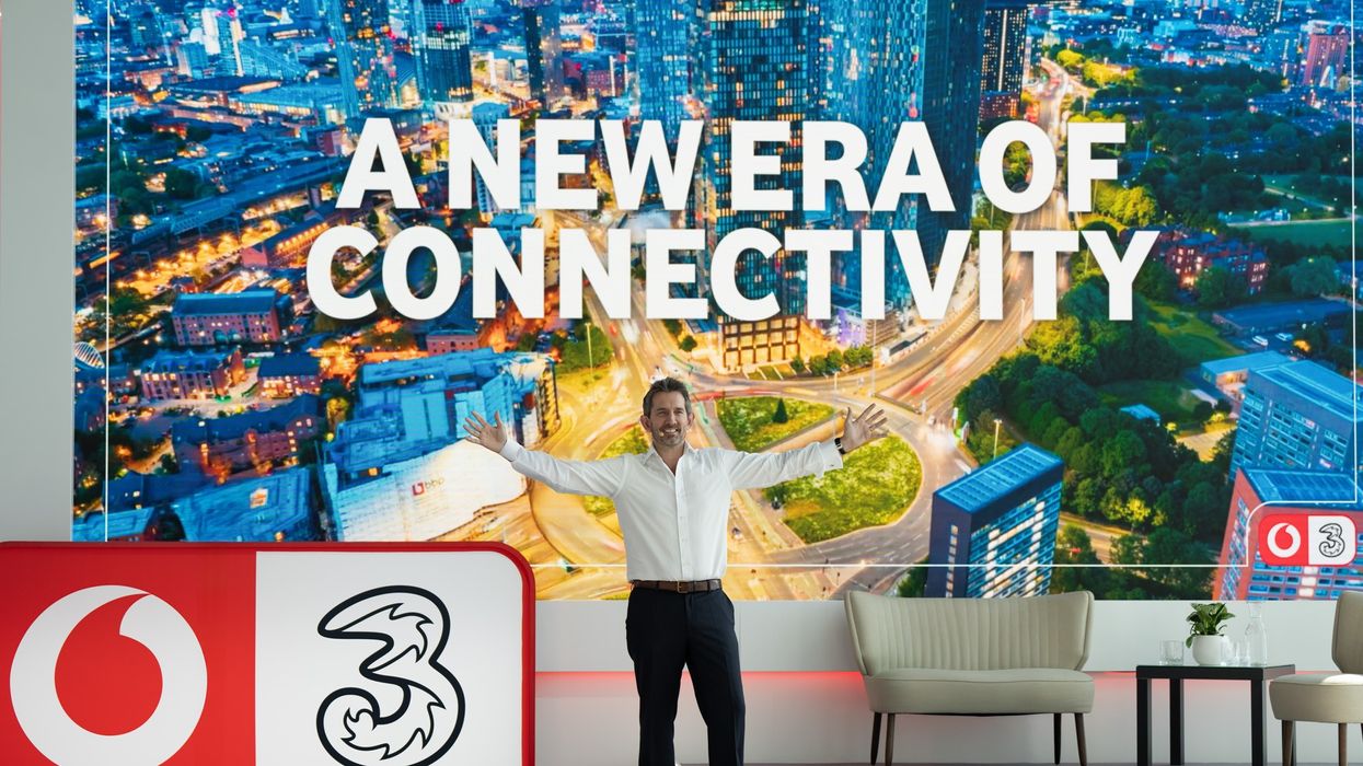 VodafoneThree CEO Max Taylor on-stage at the company headquarters