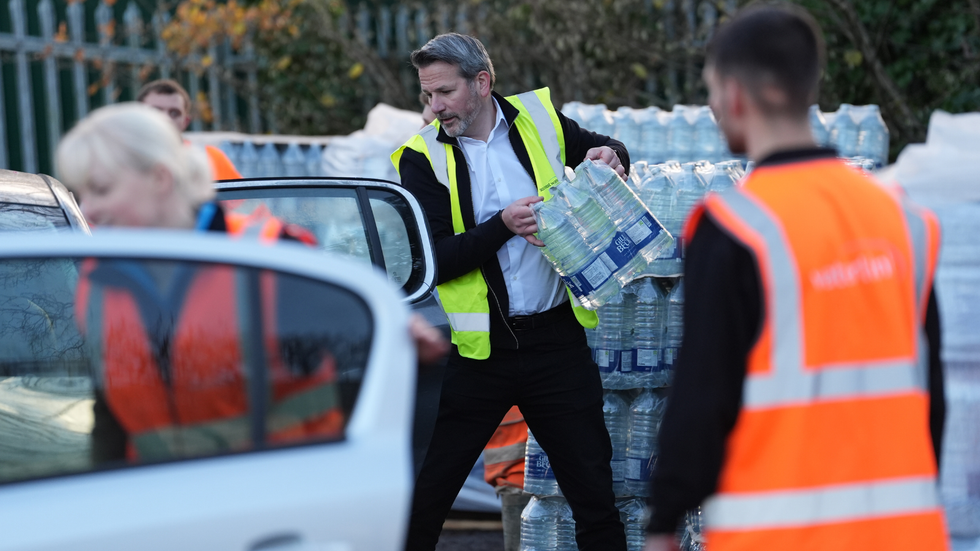 Volunteer handing out water in Tunbridge Wells