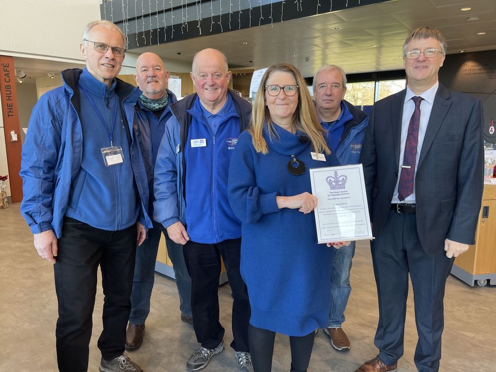 Volunteers L to R Nick Sharpe, Bob Chatterton, Phil Davies, Dave Thorne, Chief Executive Nicky van der Drift, Losses Archivist Dave Gilbert
