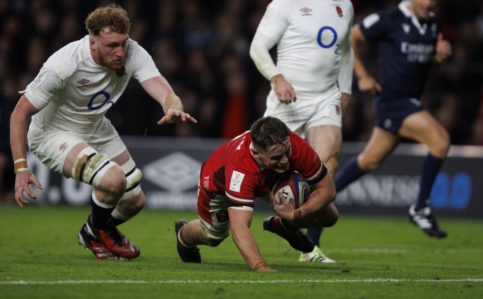 Wales' Alex Mann scores his sides second try during the Guinness Six Nations 2024 match between England and Wales