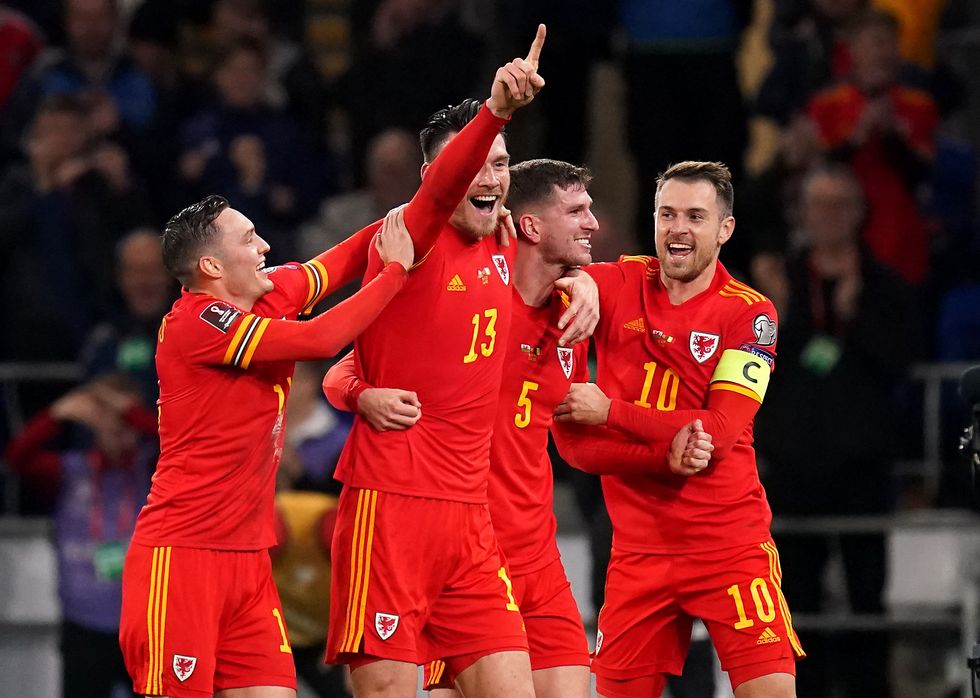 Wales' Kieffer Moore celebrates scoring their side's first goal of the game with team-mates during the FIFA World Cup Qualifying match at the Cardiff City Stadium, Cardiff.