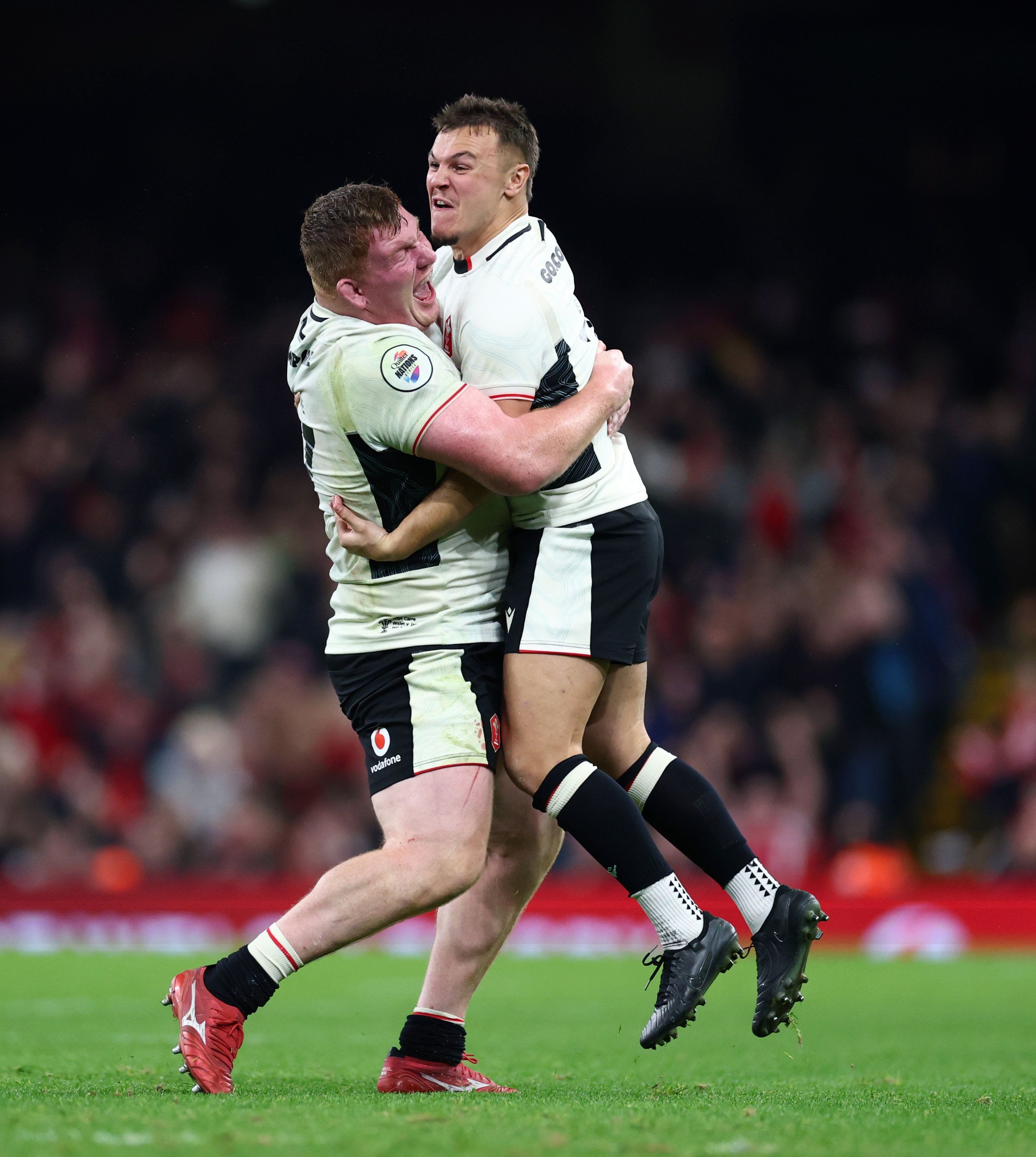 Wales Rugby Union teammates Rhys Carre and \u200bJarrod Evans pictured on the pitch of the Principality Stadium
