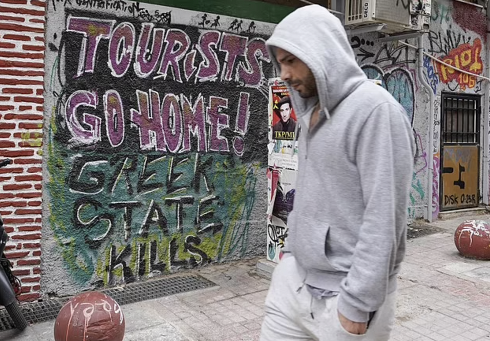 Wall covered in writing in Athens