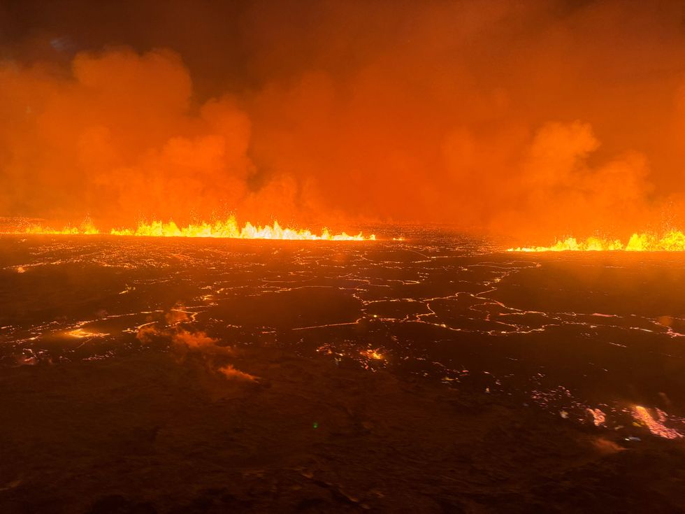Wall of fire as lava spews from Iceland volcano