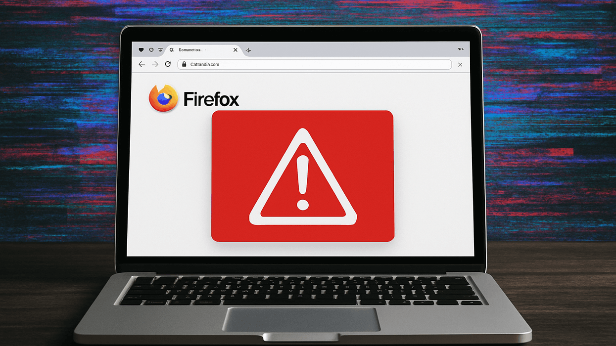 Warning across Firefox browser displayed on open laptop