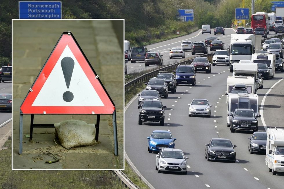 Warning sign and a busy UK motorway