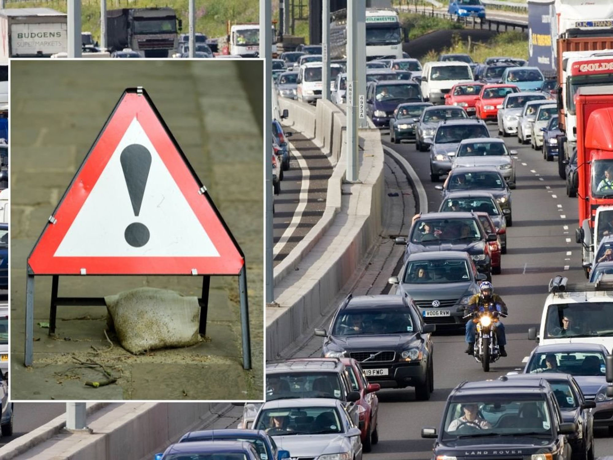 Warning sign and busy traffic