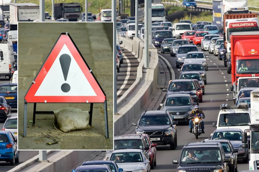 Warning sign and busy traffic