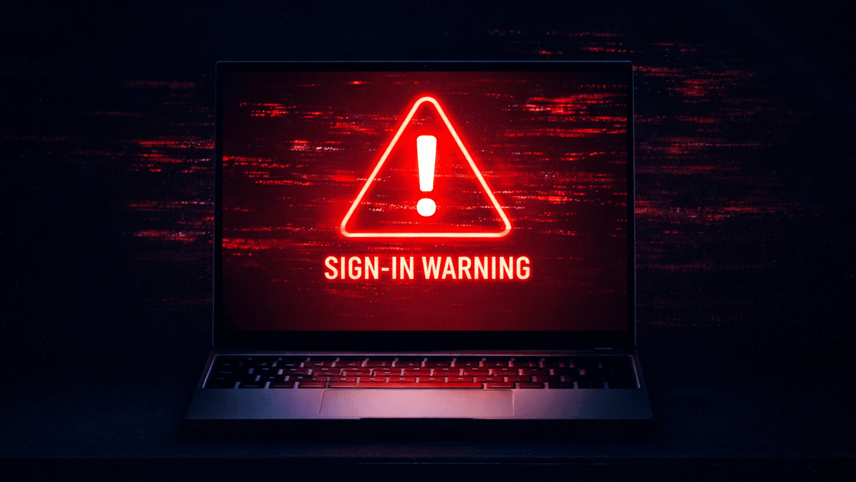 Warning symbol displayed on screen of Microsoft laptop
