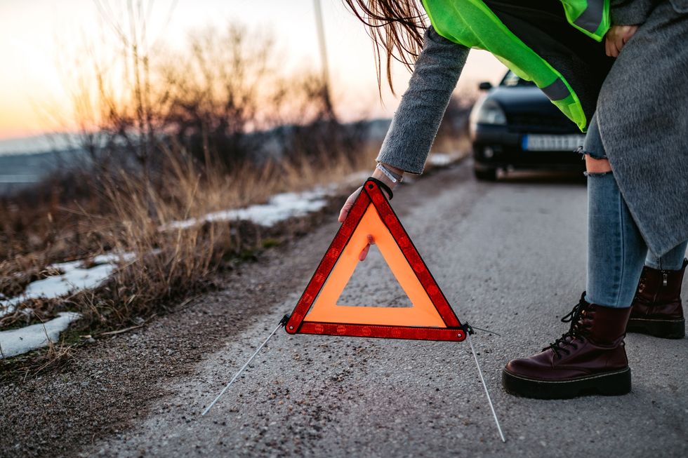 Warning triangle on road