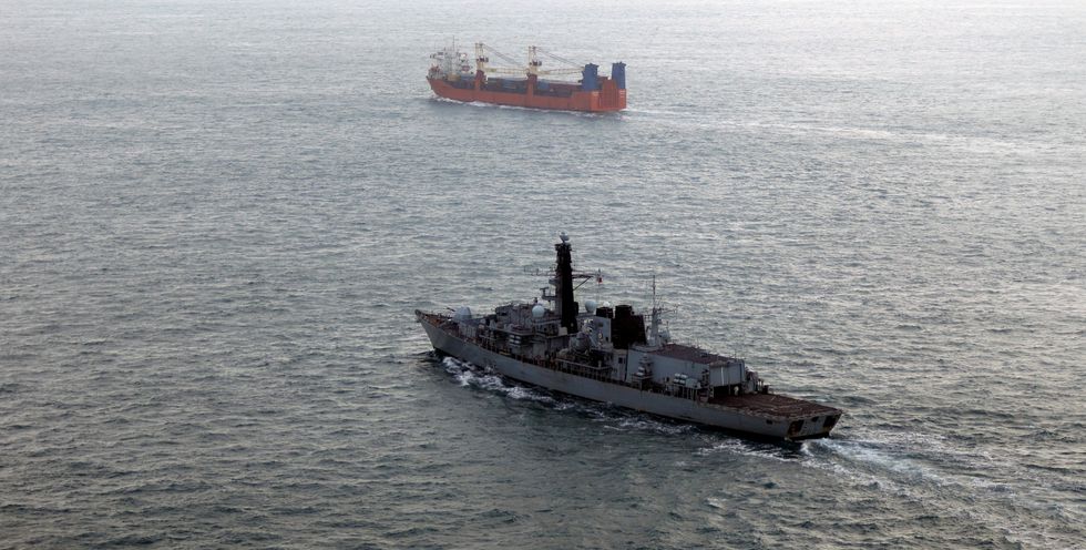 Warship Boikiy and Russian cargo ship