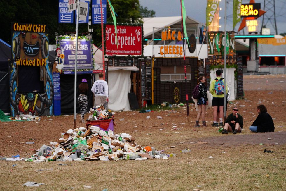 Waste left by festival goers at Worthy Farm in Somerset following the Glastonbury Festival. Picture date: Monday June 27, 2022.