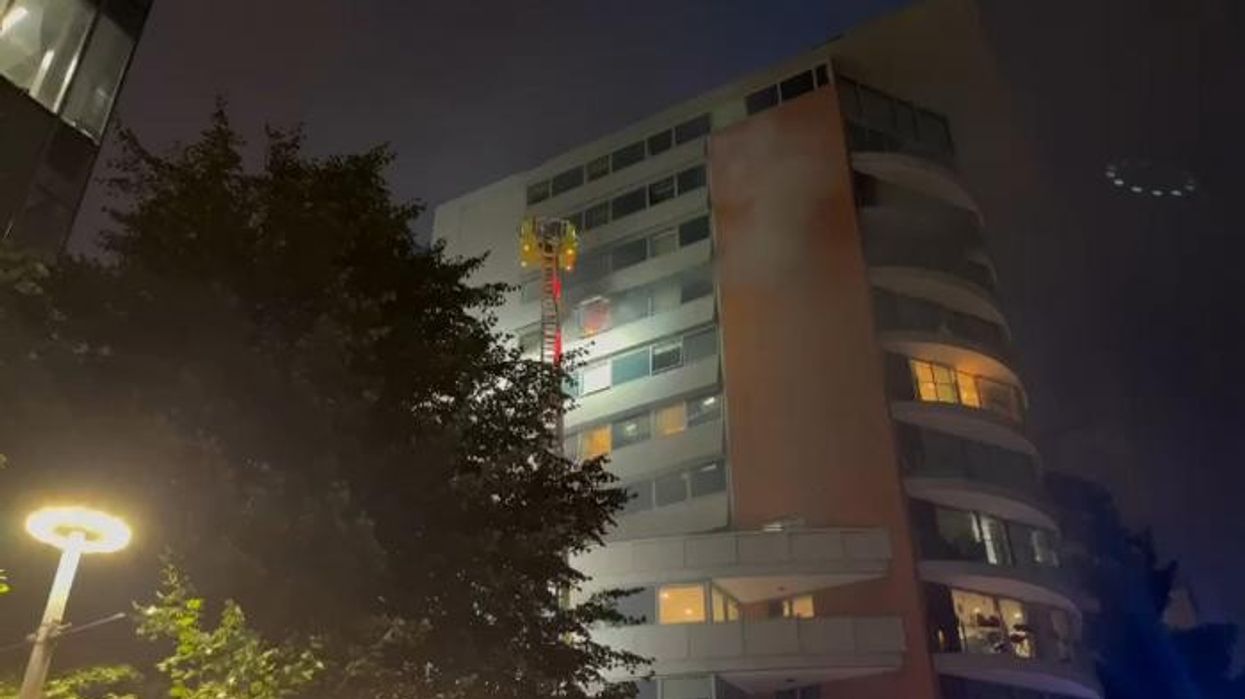 Firefighters rush to the scene as central London flat ENGULFED in flames