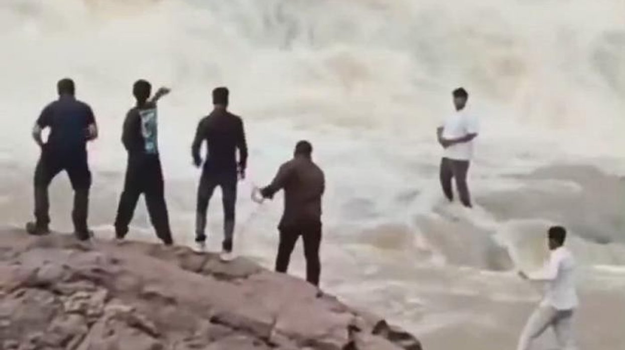 Amateur YouTuber swept away by waterfall while posing for video - and STILL hasn't been found