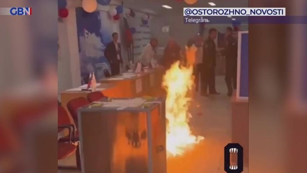 Putin fuming after man 'urinates on his parents' graves' and Russians light polling stations on fire during elections