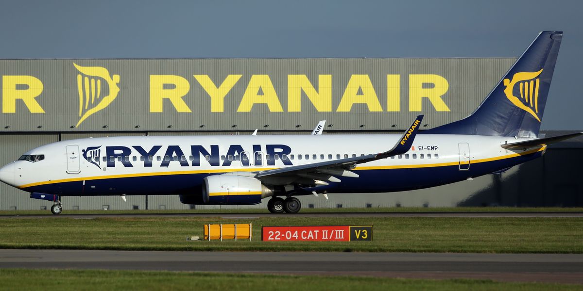 NextImg:Ryanair passenger 'urinates in aisle' as police escort disruptive holidaymakers off plane in Tenerife
