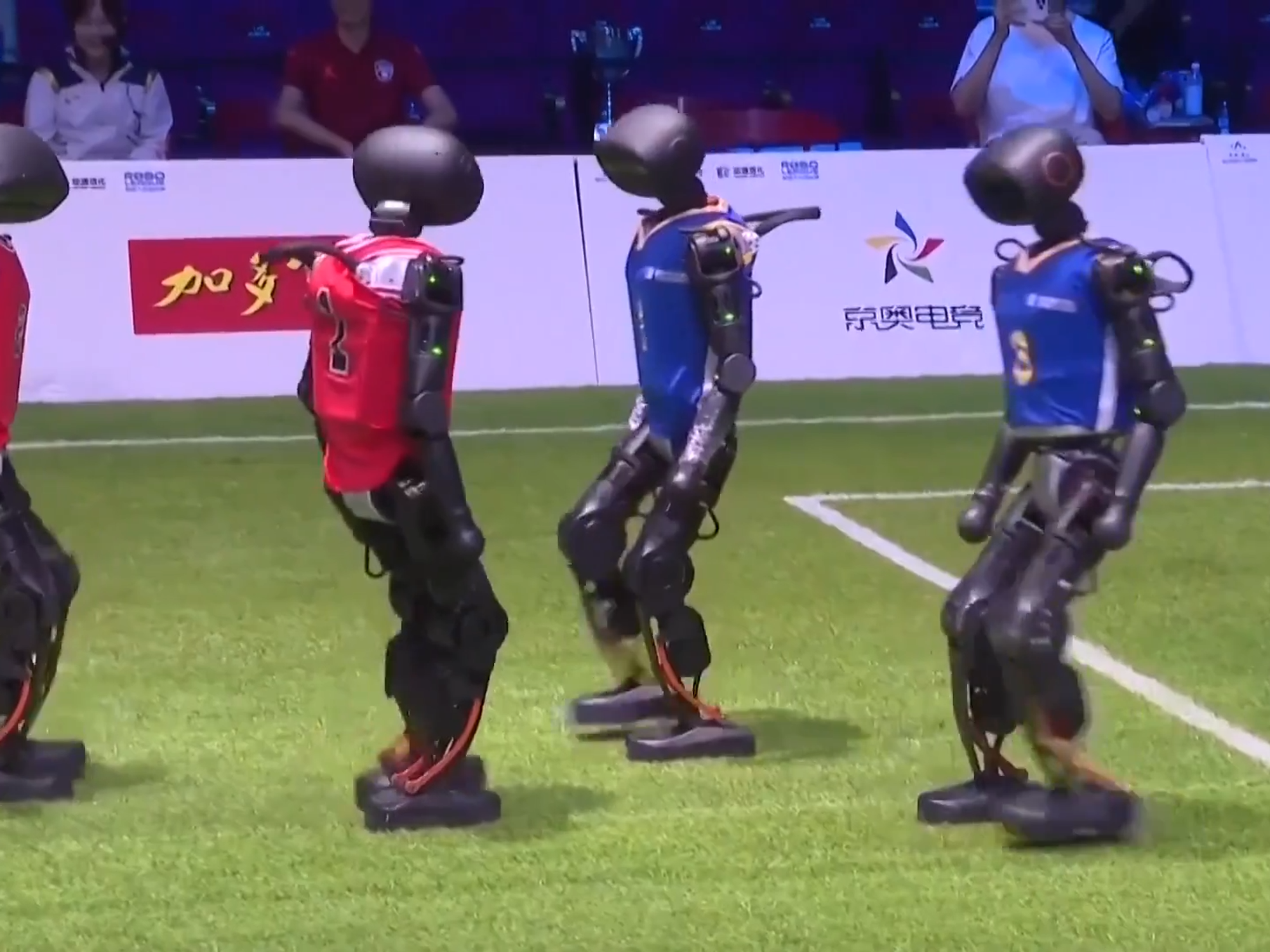 WATCH: Beijing hosts world’s first AI robot football match – ‘Maybe a team England could beat!’