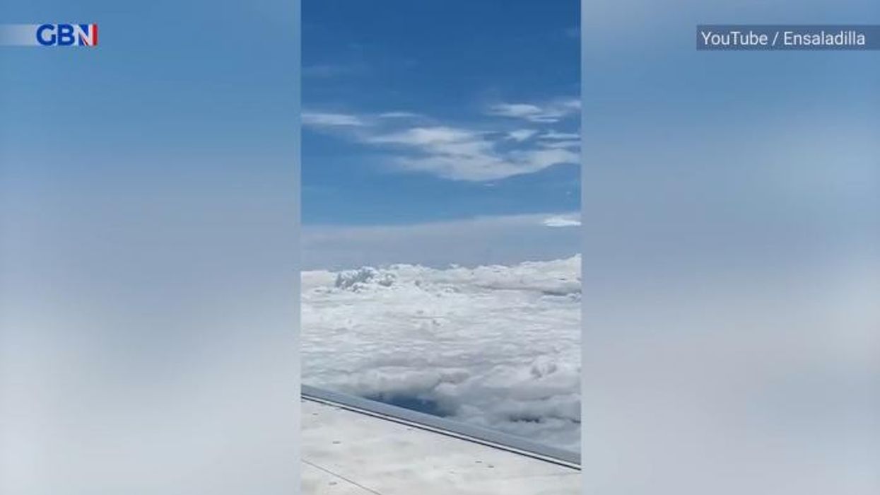 American Airlines passenger put in HEADLOCK by other flyers and dragged out for hurling antisemitic slurs on plane