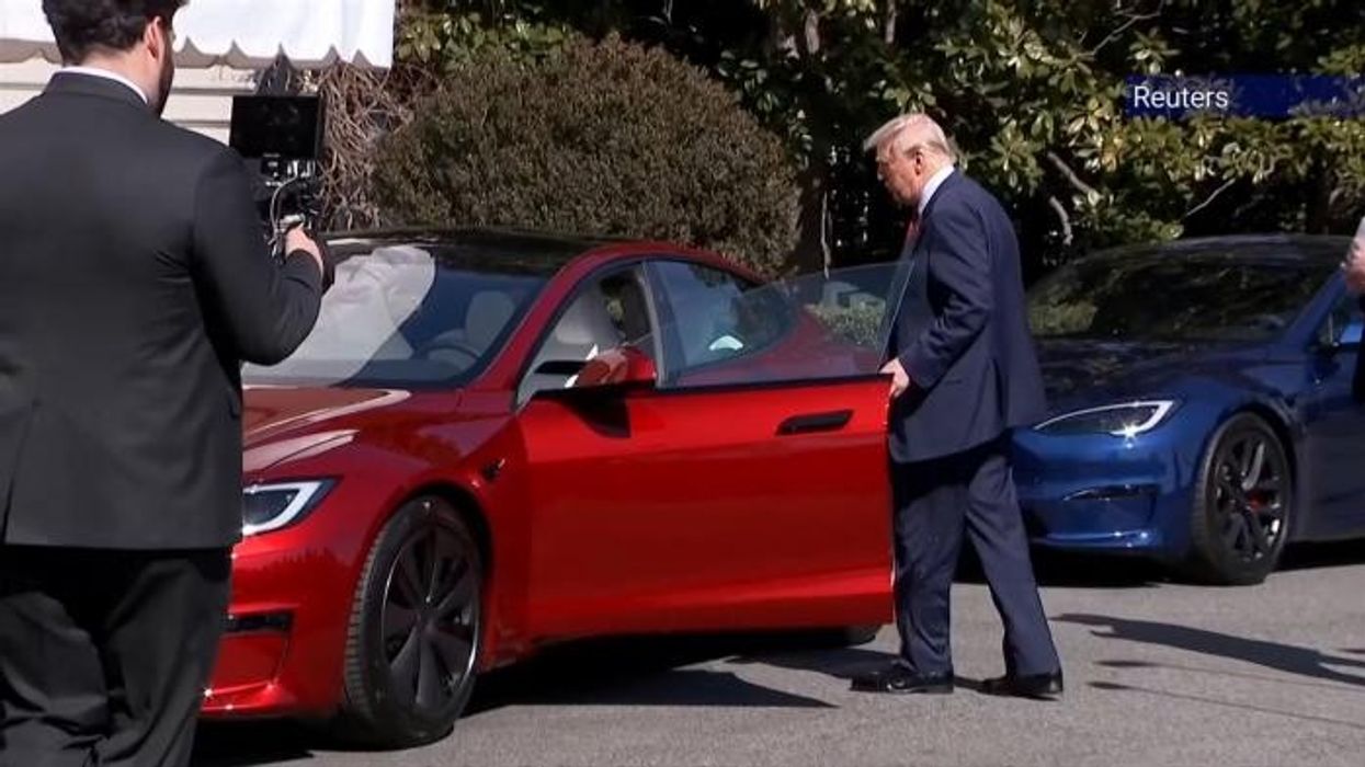 Elon Musk unveils huge Tesla update as Donald Trump brands showroom protesters as 'domestic terrorists'