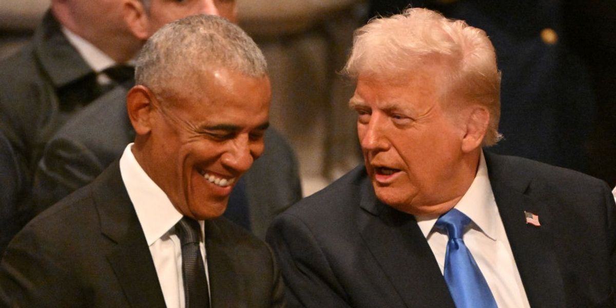NextImg:Barack Obama and Donald Trump share laugh at Jimmy Carter's funeral before being given 'death stare' by Kamala Harris