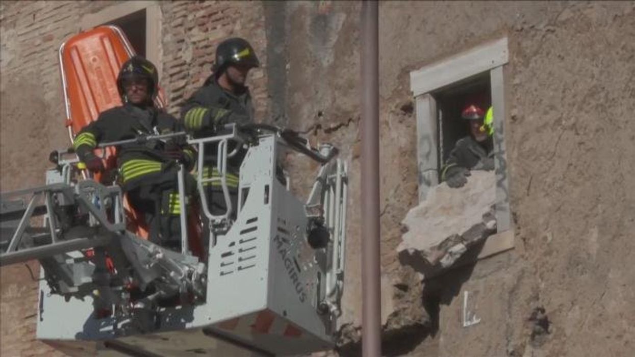 Medieval tower COLLAPSES in central Rome - worker dies after being trapped inside