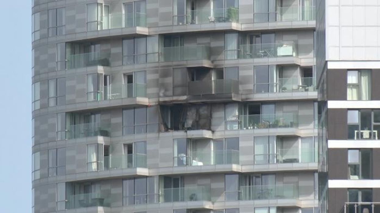 Second London building fire in just HOURS sees flat ENGULFED in flames as 'bannisters and glass fall off the cladding'