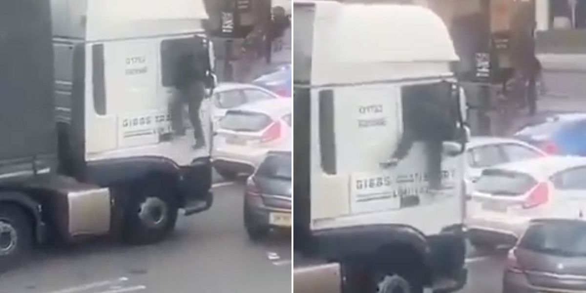 NextImg:Horrific moment road rage thug climbs into lorry window to attack driver