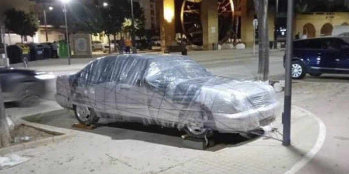 NextImg:Cars cling-wrapped as thousands evacuated ahead of new Spain flood warnings