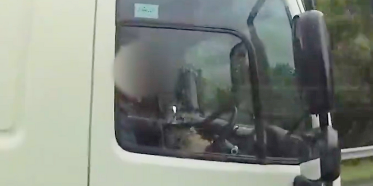 NextImg:Evri lorry driver caught on camera eating with a spoon behind the wheel at 70mph on M5