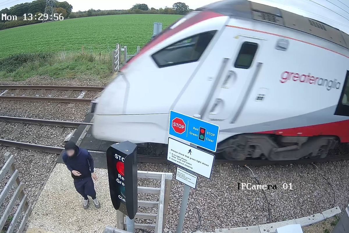 WATCH: Gobsmacking CCTV footage exposes youth's 'reckless' behaviour next to train tracks