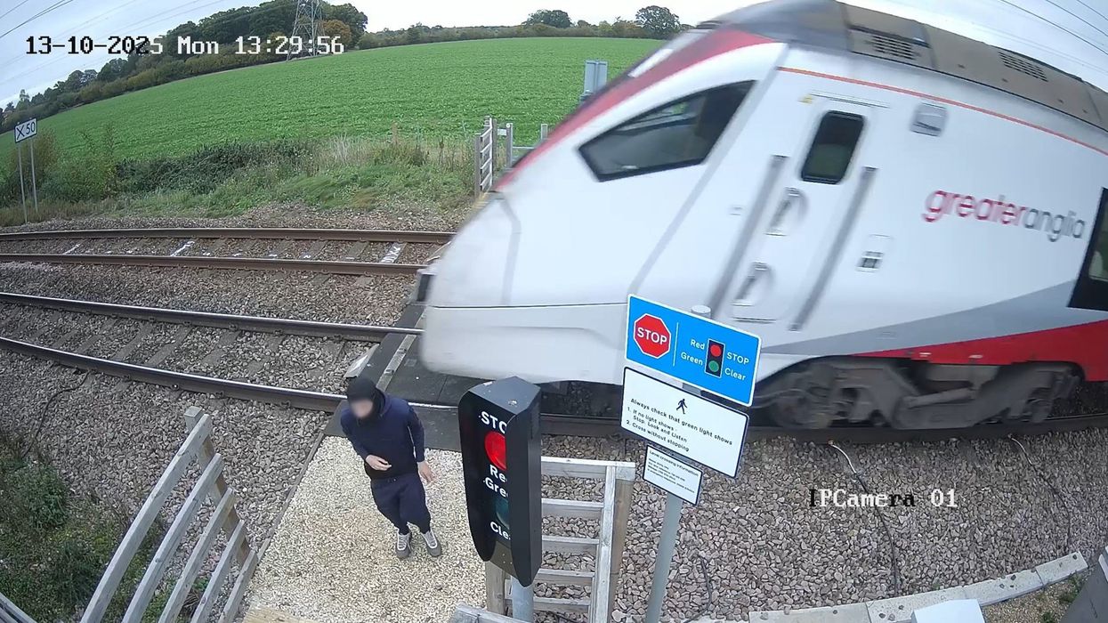 WATCH: Gobsmacking CCTV footage exposes youth's 'reckless' behaviour next to train tracks
