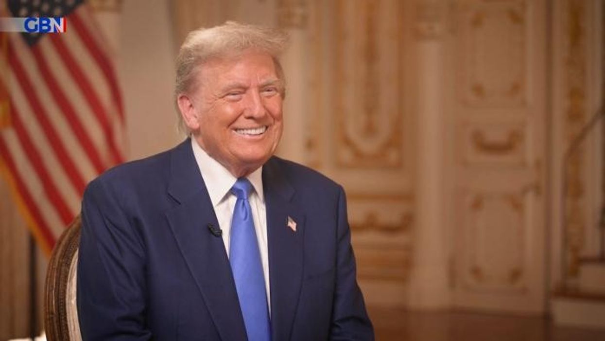 Donald Trump says he knows fast-food menu better than staff as he orders THIRTY milkshakes in surprise visit