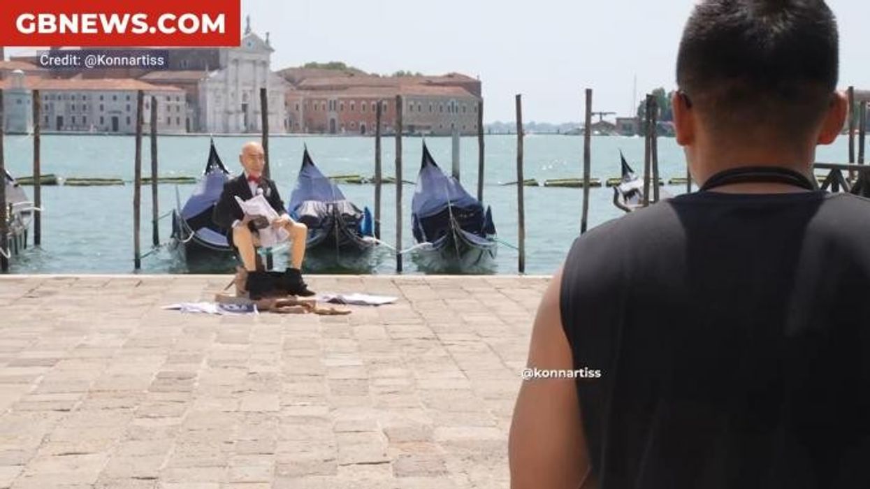 Jeff Bezos dealt further humiliation as protestors erect bizarre mannequin of Amazon owner sat on toilet near Venice canal