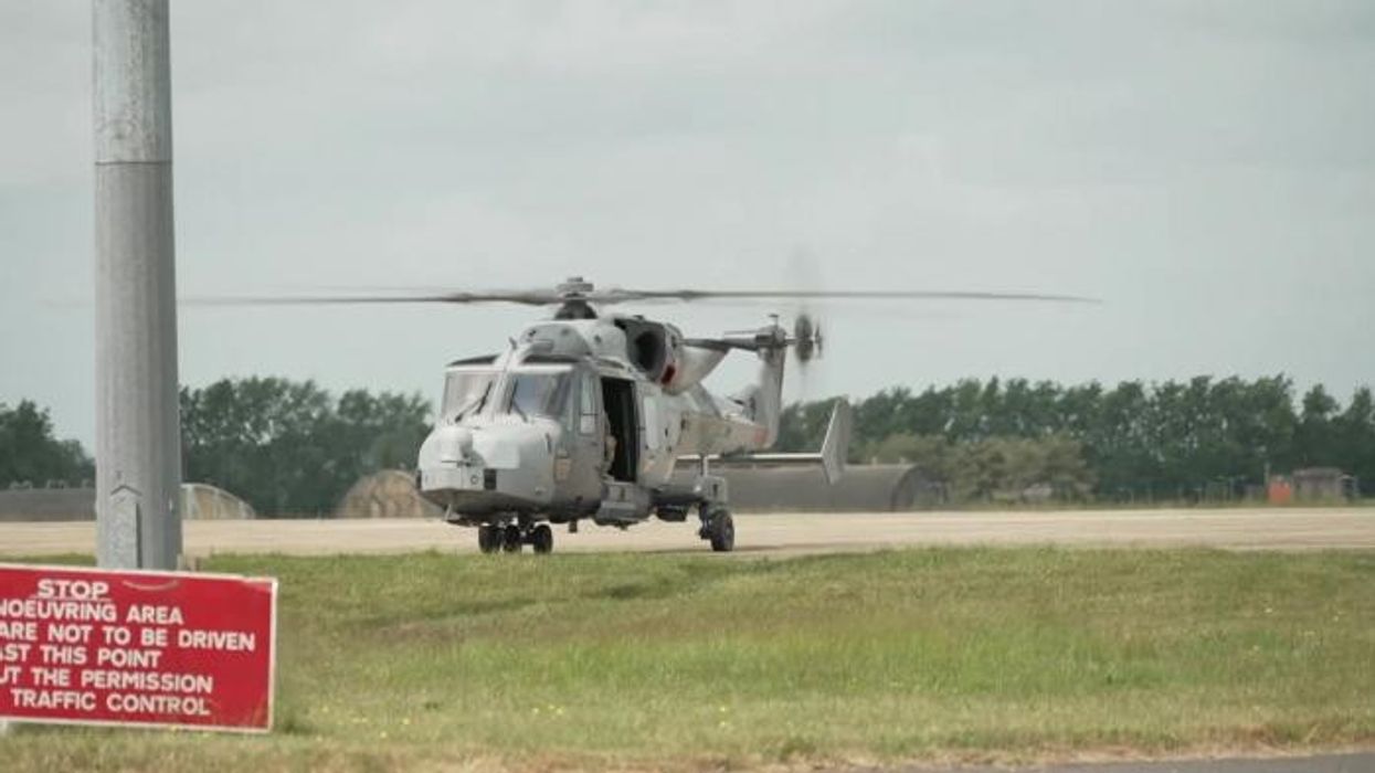 Prince William takes to the skies in a helicopter during special royal engagement