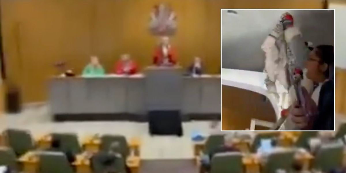 NextImg:Pro-Palestine campaigners force council meeting evacuation after demanding 'ceasefire now'
