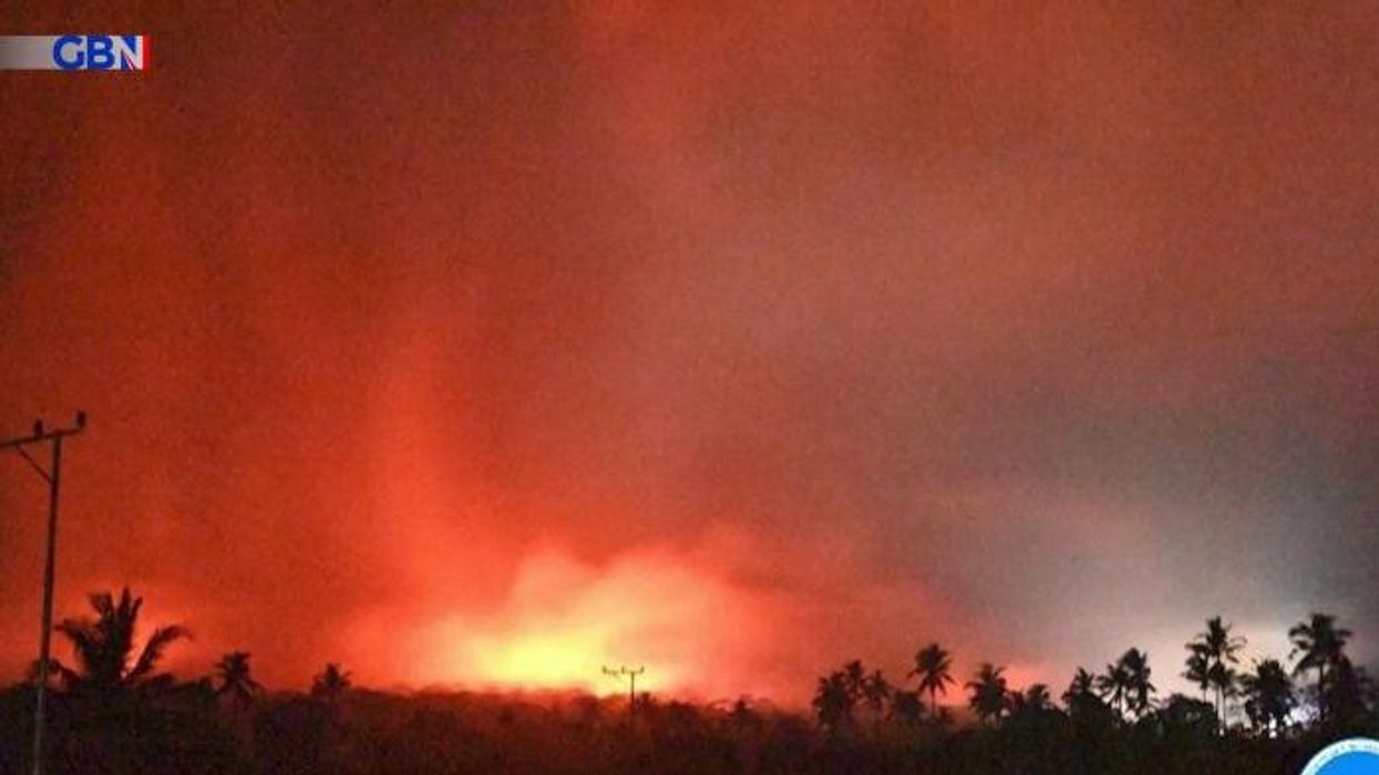 Flight 'red alert' issued after volcanic eruption sends huge ash cloud six miles into the air
