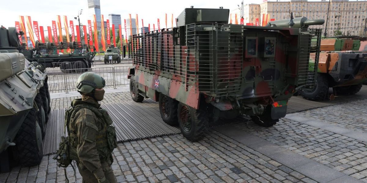 NextImg:Putin displays captured British armoured cars in Moscow after seizing them from Ukrainian forces