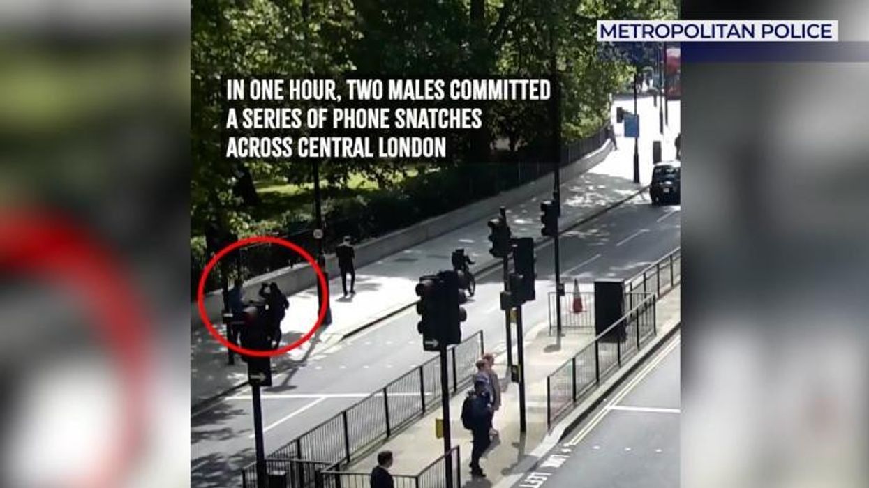 Moment thieves snatch phones from two pedestrians before police chase yobs for TWO hours through city