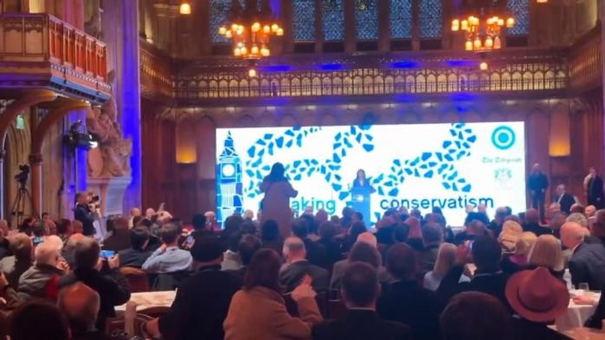 Watch moment leftie protester is bungled from London conference hall during Kemi Badenoch speech