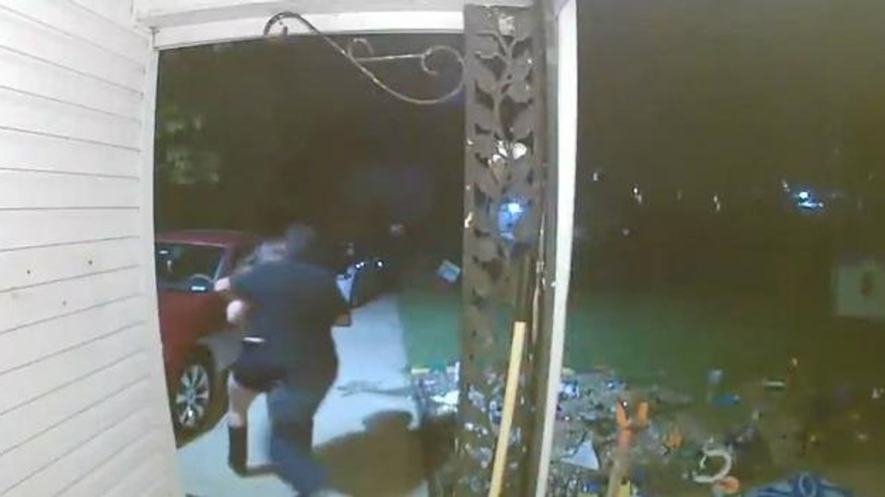 Screaming Kansas woman seen 'being abducted from her own doorstep' in chilling CCTV footage