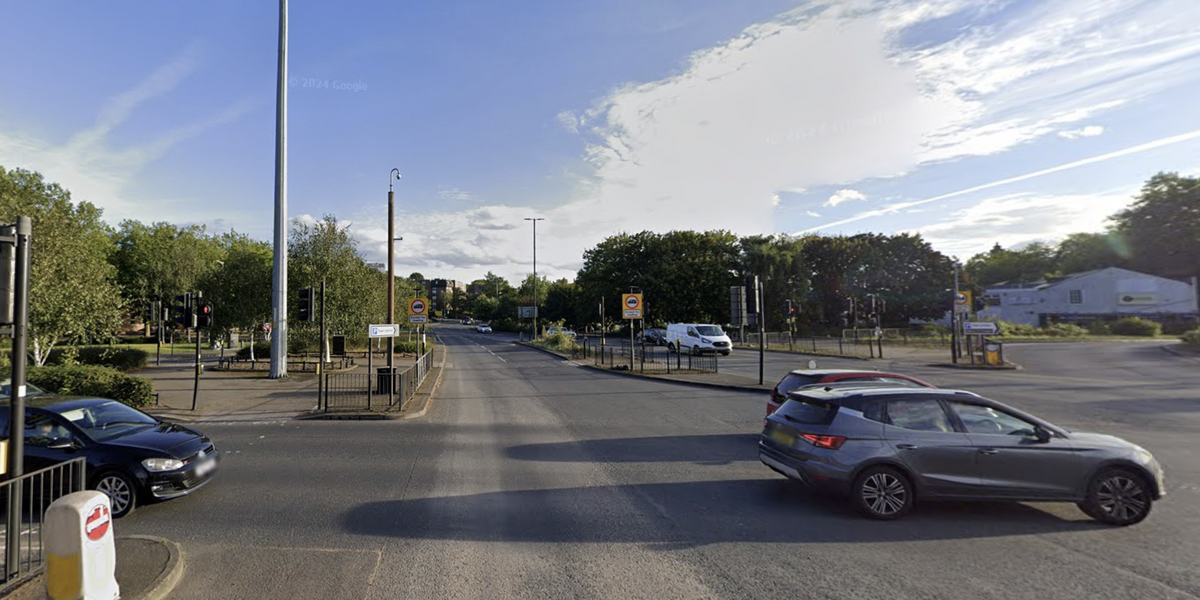 NextImg:'Professional traffic-light beggars' rake in thousands 'working shifts' at one of Britain's busiest roundabouts dubbed 'Beggars' Junction'
