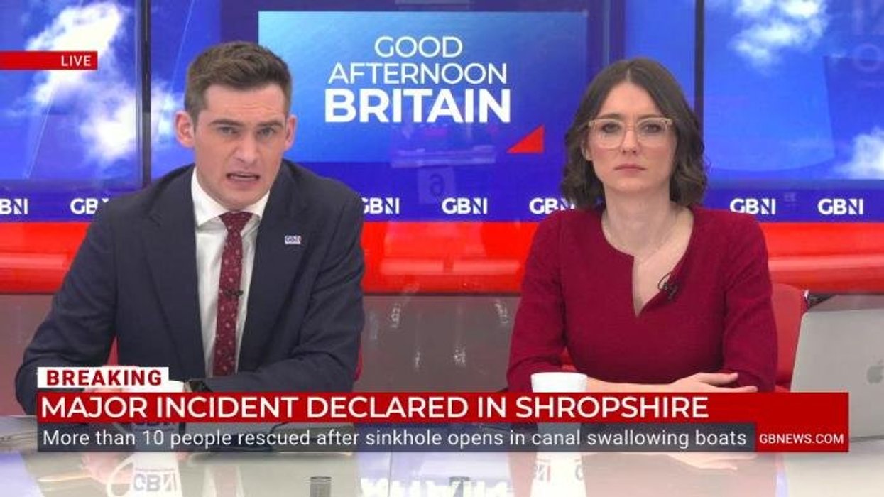 PICTURED: Three boats stranded and 10 people rescued after being swallowed by 50-metre sinkhole