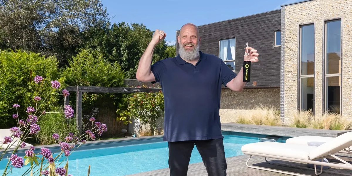 NextImg:Man who won £4.5m mansion in prize draw refuses to quit job despite newfound fortune