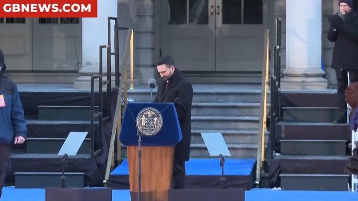 Sadiq Khan hails New York's first Muslim mayor as 'inspiring' after he is sworn in on Koran