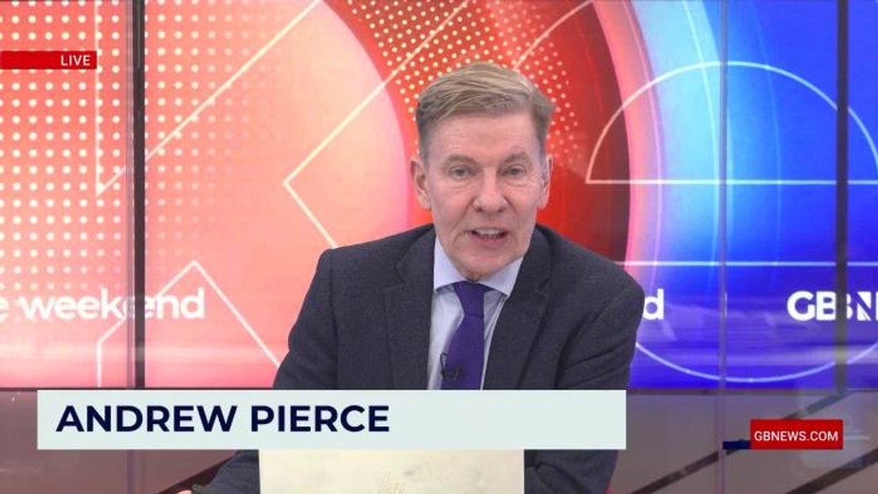 Watch the moment GB News star is confronted by pro-Iran protesters: 'I'm trying to do my job!'