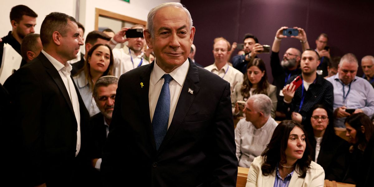 NextImg:Netanyahu rejects 'absurd' corruption charges after becoming first Israeli PM to take stand