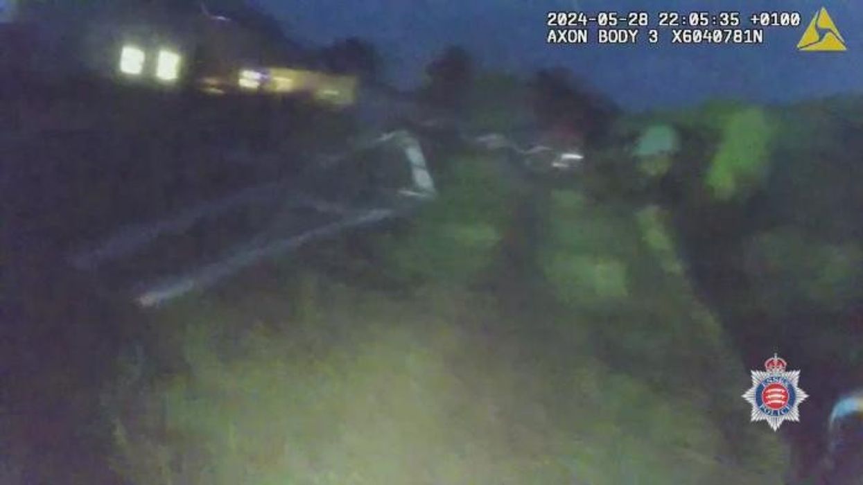 Watch the dramatic moment police arrest double murderer with his hands still covered in blood