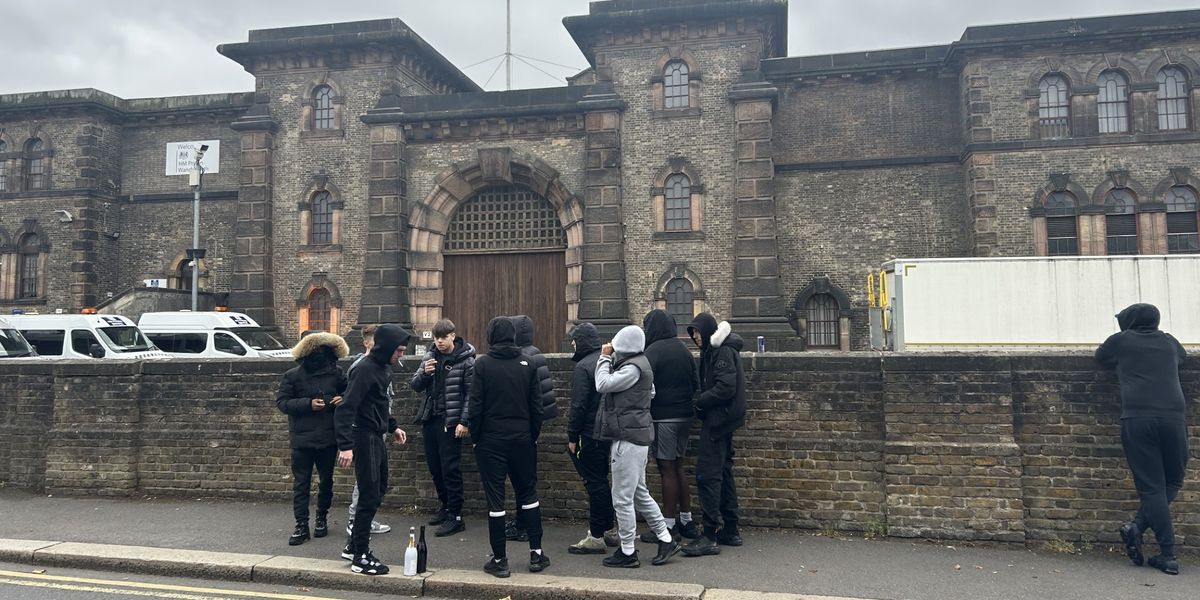 NextImg:‘Party at HMP Wandsworth!’ Champagne bottles and joints as crowds wait for early release prisoners