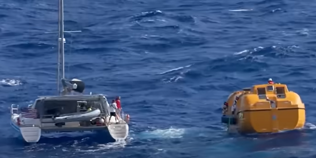 NextImg:Disney-themed cruise ship rescues four sailors from sinking 50ft catamaran